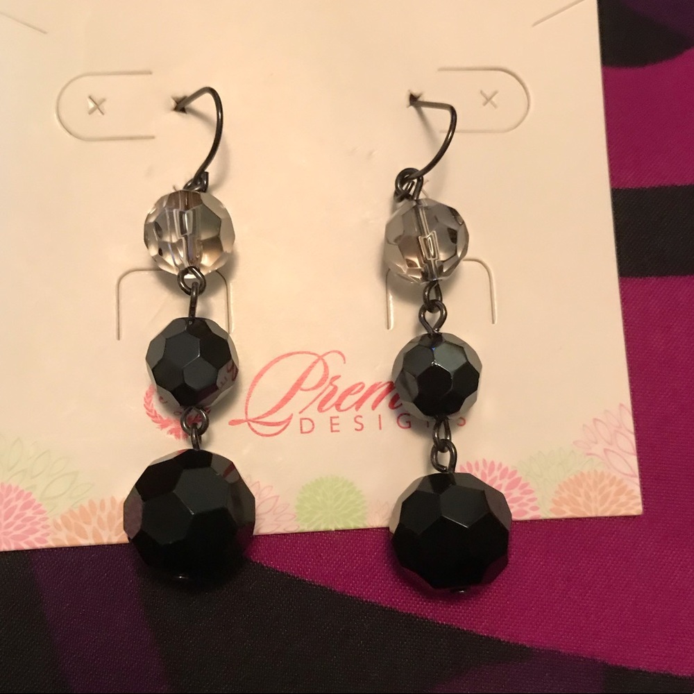 Premier earrings never worn